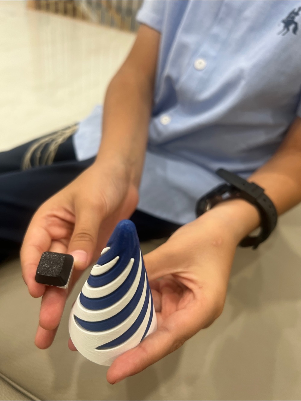 Blue and White Spiral Bluetooth Earbud Holder -